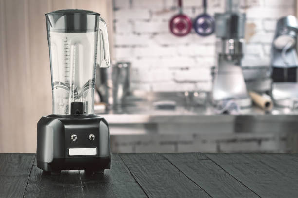istock Blender and wooden table in kitchen 934787728