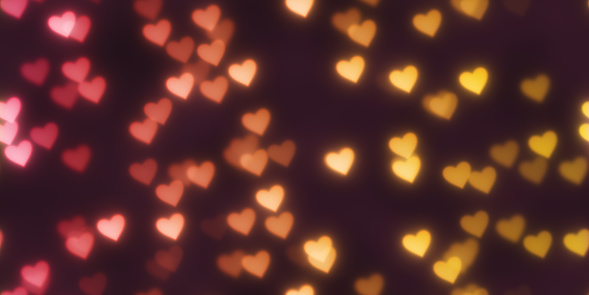 Warm Heart Shapes Bokeh Background. Abstract Figure Night Lights Texture. Abstract Glowing Forms Backdrop.