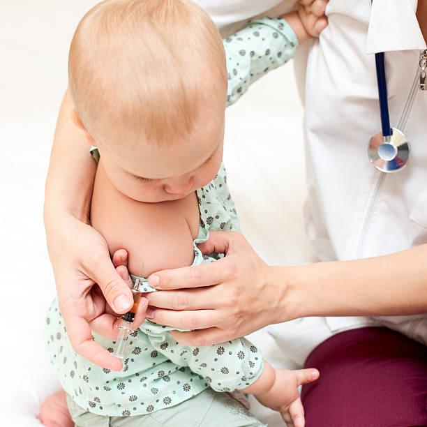 istock Little baby get an injection 93479576