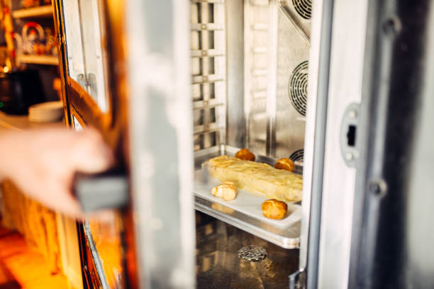 istock Apple strudel on metal baking sheet in the oven 934801878
