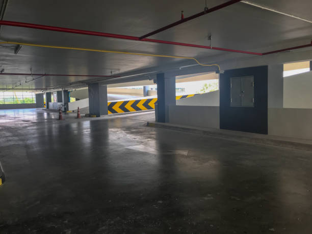 istock indoor empty car parking lot and ramp building 934813690