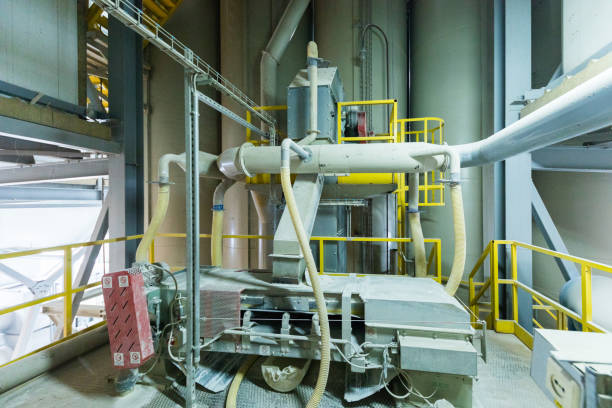 istock Factory workshop interior and machines on glass production background 934819024