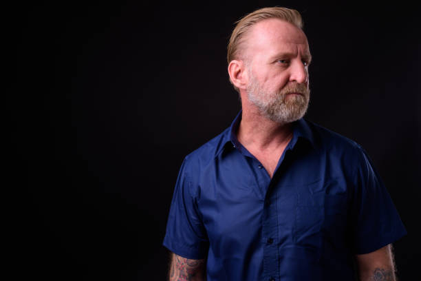 istock Mature Man With Beard And Tattoos 934822822