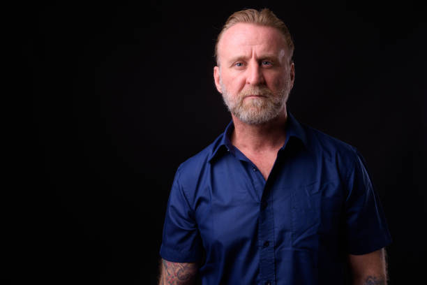 istock Mature Man With Beard And Tattoos 934822830