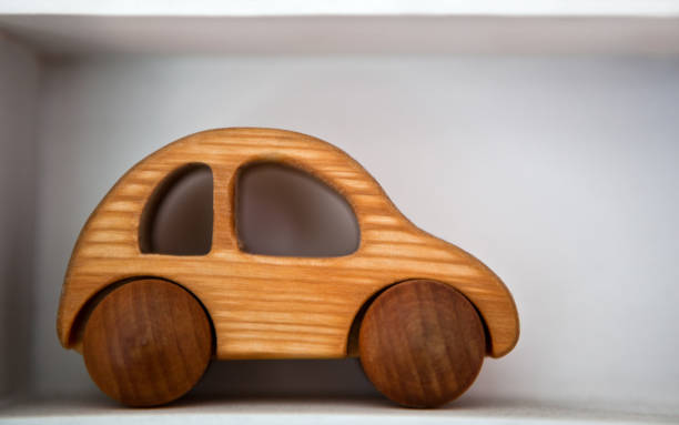 istock Wooden Toy car white garage 934823020