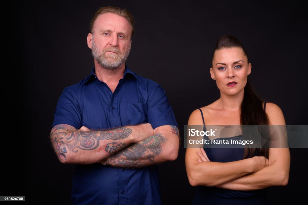 Portrait Of Couple Against Black Background Studio Shot Of Couple Against Black Background Black Background Stock Photo