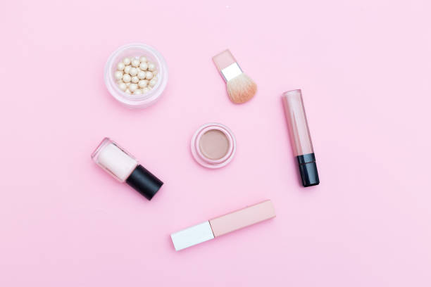 istock Nude cosmetics on pink background. Flat lay 934826824