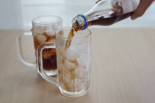 istock Soft drinks  poured in a glass of ice 934827062