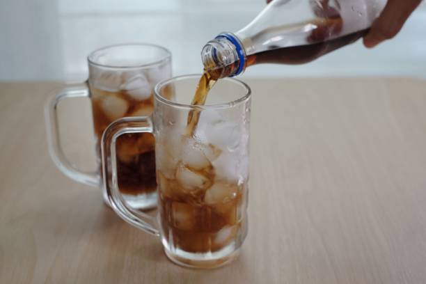 istock Soft drinks  poured in a glass of ice 934827112