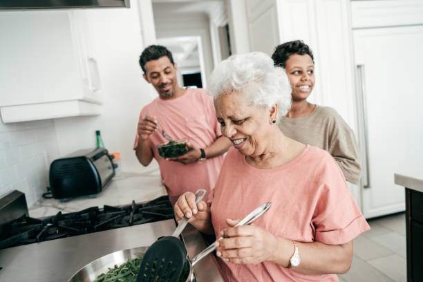 istock Grandmother cooking family dinner 934828186