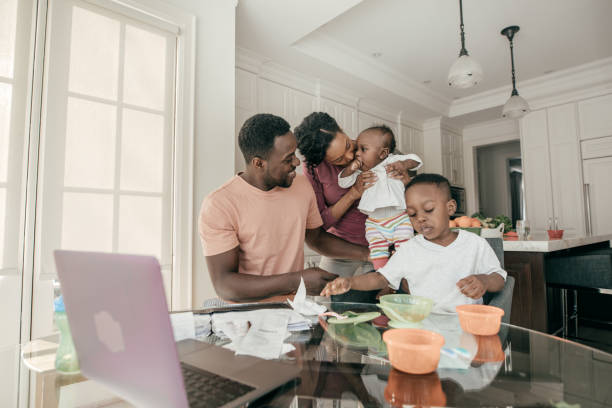 istock Family with two kids in the kitchen 934829410
