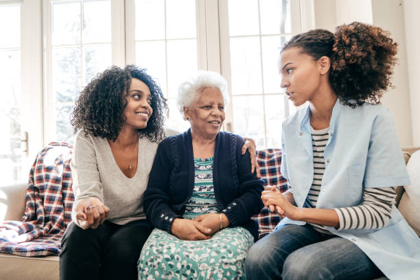 istock Nurse visiting senior lady at home 934829494