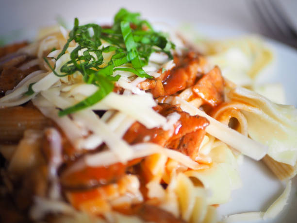istock pasta with meat, cheese, tomato sauce and basil 934831668