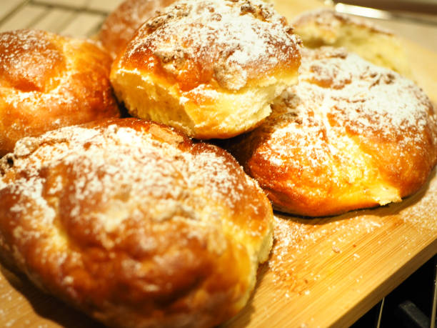 istock yeast buns baked and sprinkled with powdered sugar 934831676