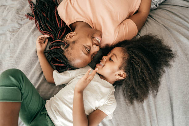 istock Mom and daughter having fun 934843530