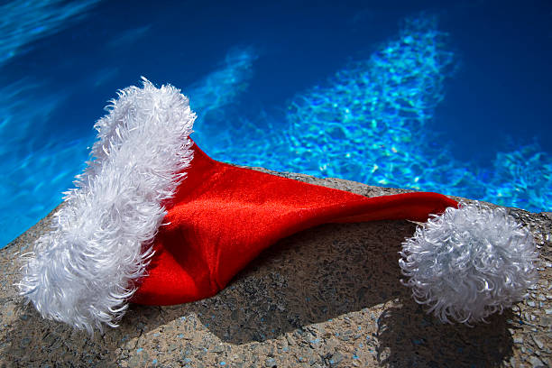 istock Santa Hat and Swimming Pool 93484529