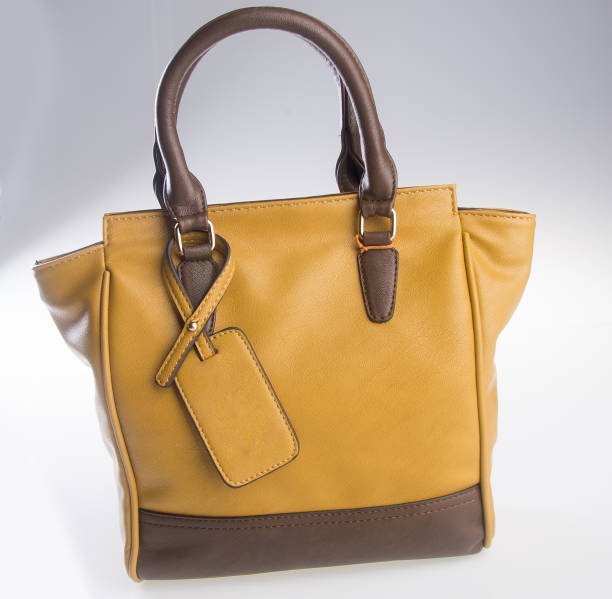 istock bag. women bag on background 934846846