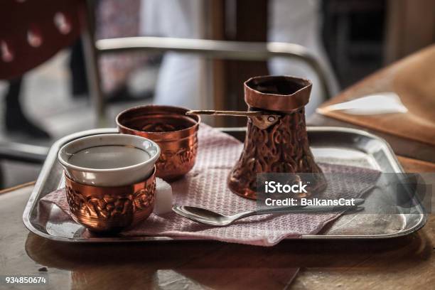 Bosnian Coffee Pot Also Known As Dzezva Taken In A Sarajevo Cafe A Dzezva Or Cezve Is A Pot Designed Specifically To Make Turkish Or Bosnian Coffee The Body And Handle Are Traditionally Made Of Brass Or Copper Stock Photo - Download Image Now