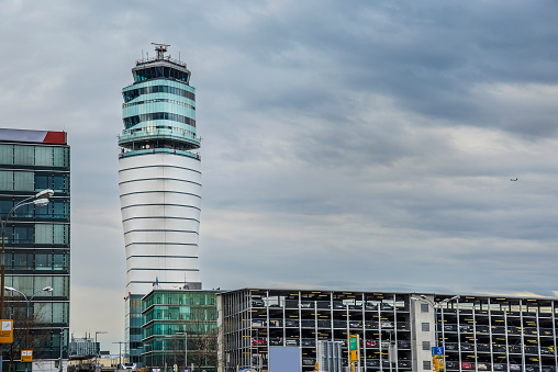 Airport tower in Vienna Austria with overcast sky