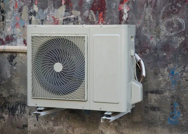 Airconditioner on the  wall of the house
