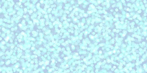 istock Light Sky Blue Bright Bokeh Background. Glowing Lights Texture. Shine Celebration Backdrop. 934859116