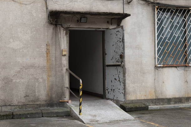 istock sidewalk by street wall & door 934866834
