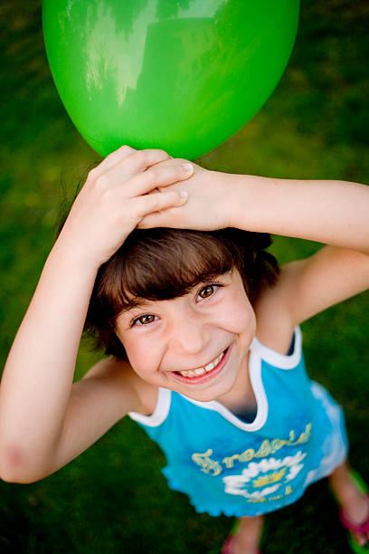 istock little girl with balloon 93486866