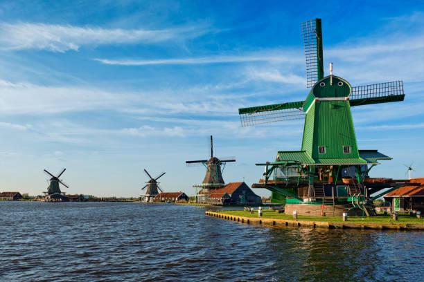 istock Windmills at Zaanse Schans in Holland on sunset. Zaandam, Nether 934873758