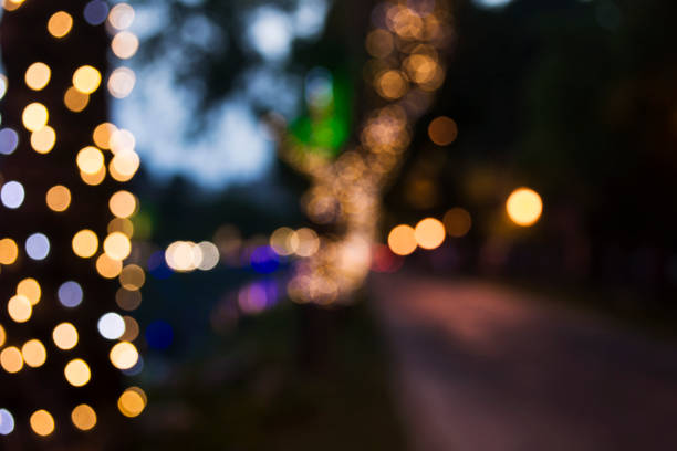 istock Christmas lights blurred on city streets 934874288