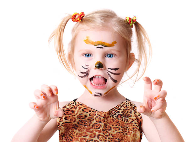 girl in suit of tiger  cat face paint stock pictures, royalty-free photos & images