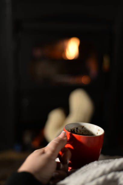 istock Woman's hands holding hot cup of coffee 934883676