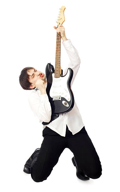 homem com guitarra - isolated on white studio shot guitar young men - fotografias e filmes do acervo