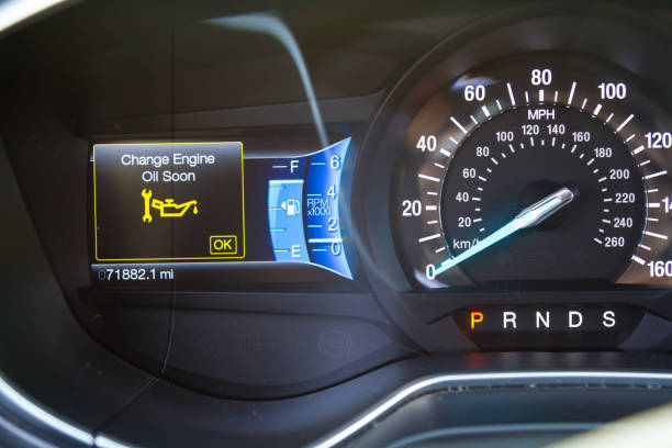 Change oil soon message on car dashboard stock photo