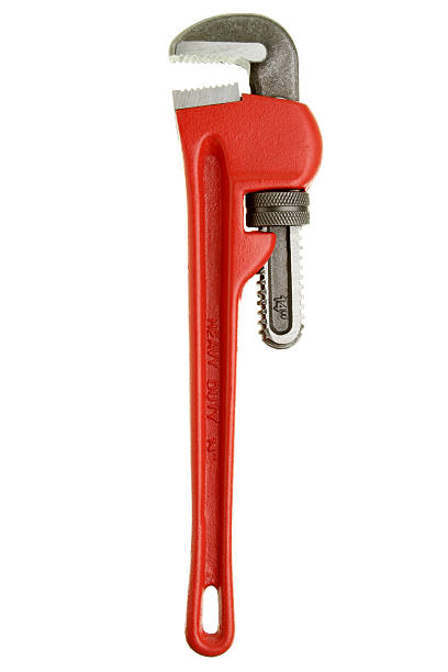 Red wrench on a white background Pipe wrench isolated on white. adjustable wrench photos stock pictures, royalty-free photos & images