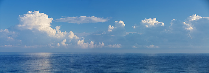 panorama of an open sea with a clouds