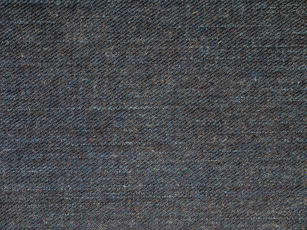 istock Dark indigo washed denim fabric texture swatch 934910050