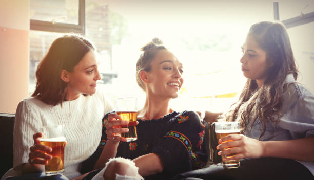 istock Three young girls having fun together in the restaurant 934915804