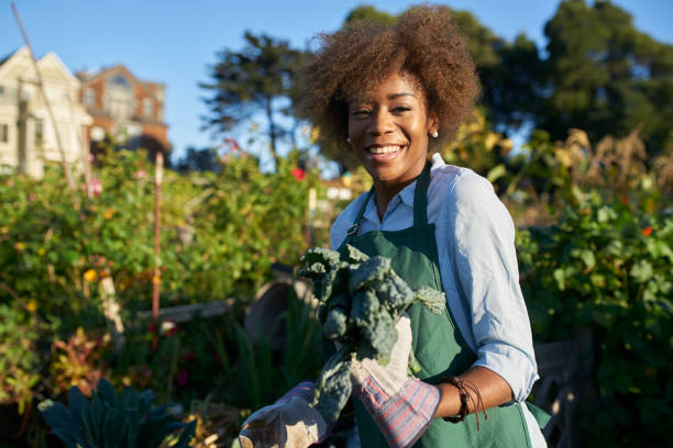 istock proud diverse millenial posing with freshly picked kale 934919422