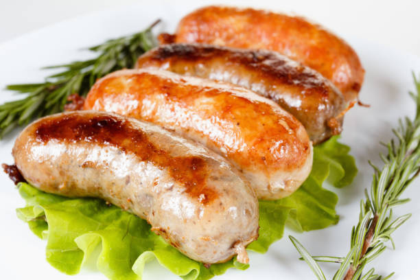 istock Roast beef or chicken sausage on a plate 934922106