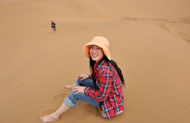 istock Asian girl smiling in desert 93492220