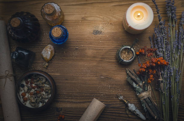 istock Magic potion. Herbal medicine. Druid shaman or witch doctor desk table background with copy space. 934927348