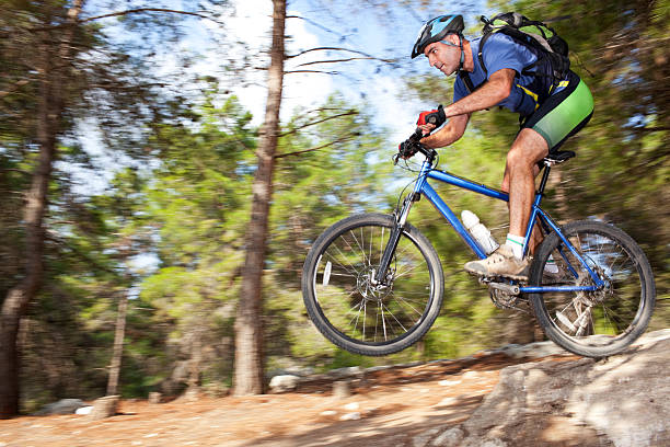 istock Bike riding in forest. 93493227
