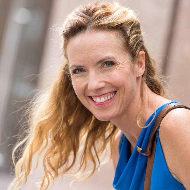 istock Smiling Mature Blond Woman 934940226