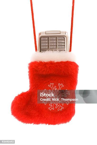 Patrón De Navidad Roja Con Teléfono Celular Foto de stock y más banco de imágenes de Adorno de navidad - Adorno de navidad, Blanco - Color, Bota