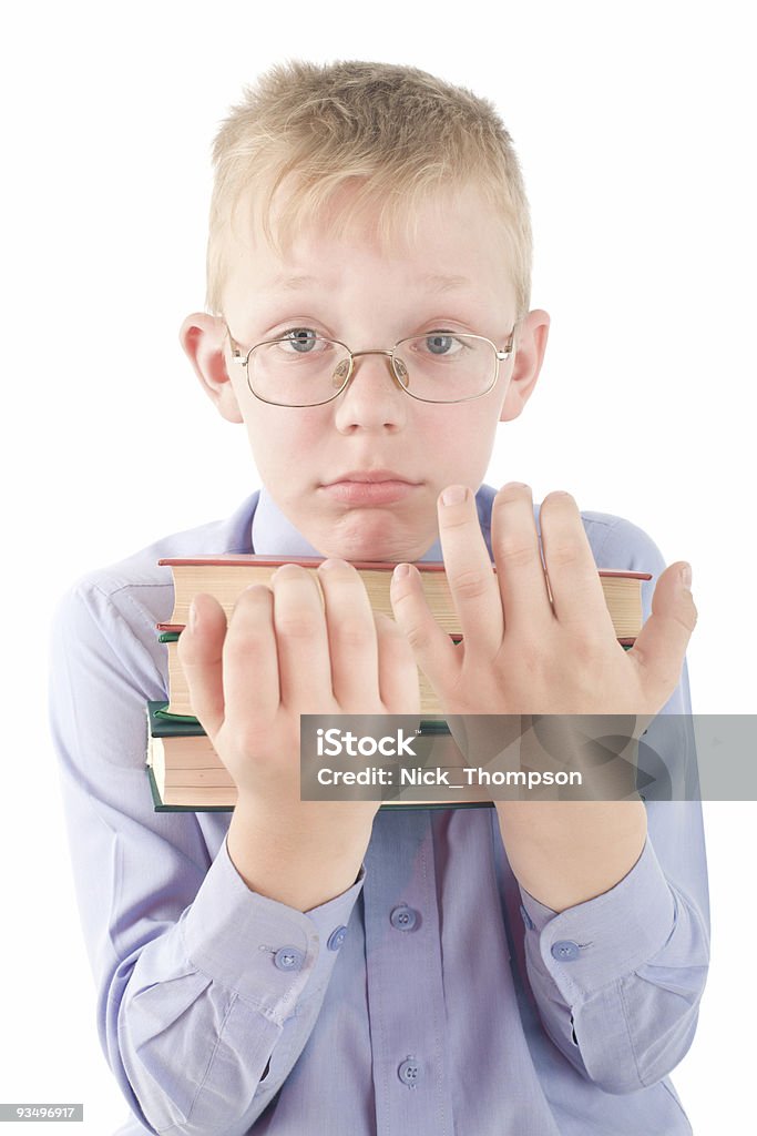 Retrato de menino segurando três livros confuso - Foto de stock de Abraçar royalty-free