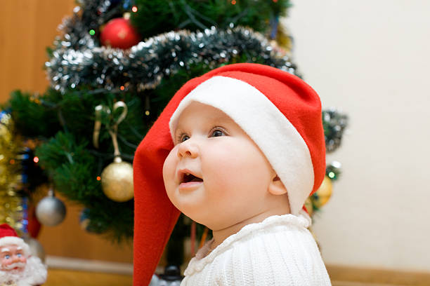 istock Little girl in red Santa hat 93497488