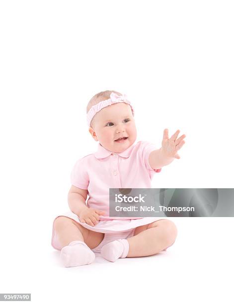 Sweet Happy Little Girl Reach One Hand Stock Photo - Download Image Now - Baby - Human Age, Reaching, Sitting