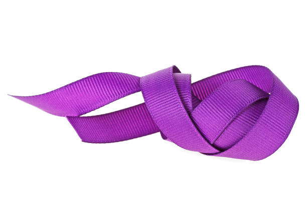 istock Beautiful purple ribbon isolated on white background 934979160