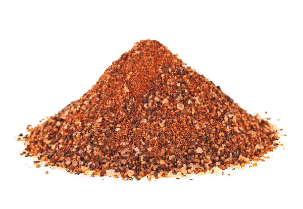 istock Mixture of ground peppers on a white background 934980960