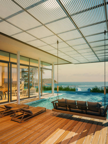 пляжный дом - swimming pool infinity pool patio sea стоковые фото и изображения